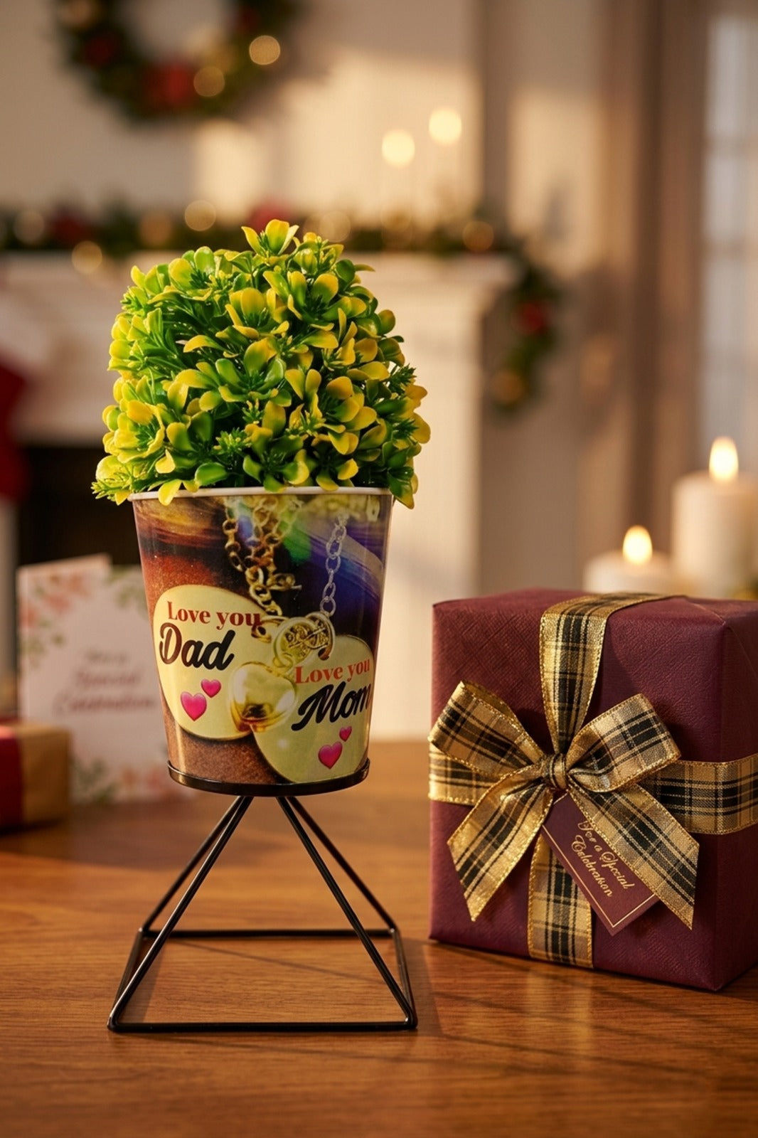 Artificial Plant in “Love You Mom Dad” Printed Metal Pot with Stand | Decorative Gift Plant for Parents